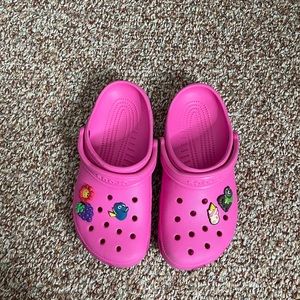 Pink crocs